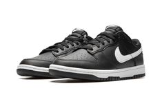 The Nike Dunk Low “Black/White” is a versatile, black-and-white colorway of the retro basketball and lifestyle shoe.  Also known as the “Black Panda 2. 0” colorway, the Dunk Low in this “Black/White” rendition features a black leather upper with a white leather Swoosh on the sides.  “Nike” branding is embroidered in white lettering on the heel and white “Nike” and Swoosh detailing can be found on the tongue tag.  To complete the look, Nike finishes off the sneaker with a white rubber midsole and Athletic Models, Nike Branding, Retro Basketball, Limited Edition Shoes, Nike Brand, Giant Panda, October 29, White Nike, Sportswear Brand