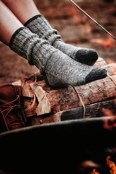 "Boot Socks Knitting Pattern, Cozy Cabin Socks Pattern | CAMP SOCKS \"The nostalgia of a vintage sock pattern combined with modern details, The Camp Socks are the perfect boot socks for outdoor activities or to cozy up in by a campfire. Perfect for first-time sock knitters, the classic ribbing at the ankle flows into rhythmic stockinette, set apart by thoughtful color changing details at the cuff, toe, and heel. Designed with wear in mind, the sturdy heel makes these classic socks durable and a Boot Socks Knitting Pattern, Knit Socks Pattern, Socks Knitting Pattern, Camp Socks, Knit Boot Socks, Advanced Knitting, Socks Knitting, Cabin Socks, Vintage Socks