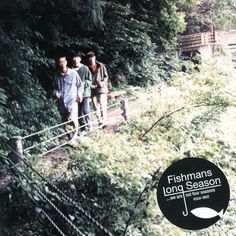 two men walking down a path in the woods