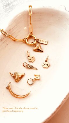 Mix and match your favorite pendant charms to create a personalized piece of jewelry. Each charm is sold separately and individually. Item Details:This is a listing for ONE(1) Gold Charm. ( Including a 14k gold-filled jumping 7mm ) Tiny Butterfly Charm, Natural Bronze, 10mm.Paw Charm, Natural Bronze, 9mm.Shark Tooth Charm, Natural Bronze, 11mm.Wing Charm, Natural Bronze, 15mmCrescent Moon charm Natural Bronze, 22 mm *Natural Bronze - Our bronze is a high-quality Italian copper and tin alloy cont Dangle Charm Necklaces For Gifts, Dangle Charm Necklaces As Gift, Gift Charm Necklaces With Dangle Charms, Charm Bracelet With Dangling Charms, Charm Bracelet With Dangling Pendants As Gift, Charm Bracelet With Dangling Charms For Gift, Dainty Charms Jewelry For Personalized Gift, Dangling Charms For Valentine's Day Gift, Customizable Pendant Jewelry For Keepsake