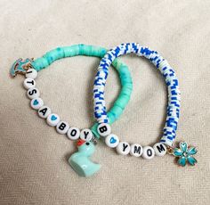 This blue gender reveal bracelet is a sweet and simple accessory that's all about celebrating a baby boy. It's a dainty bracelet adorned with various shades of blue beads, creating a lovely and unique look. It's the perfect way to share the exciting news of your baby's gender with a touch of elegance. Gender Identity Bracelets, Gender Reveal Bracelets, Cute Turquoise Beaded Bracelets As Gift, Blue Friendship Bracelets For Mother's Day Gift, Blue Hypoallergenic Name Bracelet For Birthday, Hypoallergenic Blue Name Bracelet For Birthday, Cute Blue Friendship Bracelets Gift, Cute Blue Beaded Friendship Bracelets, Blue Name Bracelet For Mother's Day Gift