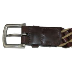 This striking and versatile 38mm braided belt adds a touch of personality and style to any casual or formal outfit. The silver-finish brass buckle stands out against the contrasting Full Grain leather lacing and cotton cord. Handcrafted in the USA with vegetable tanned leather. Made of Cotton and Leather Casual Leather Belts And Suspenders, Formal Leather Rope Belt, Casual Leather Rope Belt, Casual Leather Belt With Brass Buckle, Casual Braided Leather Belt, Casual Adjustable Leather Belt Buckles, Brown Leather Rope Belt, Classic Leather Rope Belt, Classic Braided Leather Belt