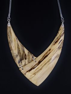 The necklace is one of a kind, handmade from Hackberry wood and has very smooth and brilliant surface. Stainless steel mesh chain 26 inch. Closure Lobster claw Care instructions: Avoid direct contact with perfumes, alcohol, water and other solvents that may damage wood finish. Wipe jewelry with soft dry cloth. Handmade Natural Wood Pendant Jewelry, Unique Natural Wood Pendant Jewelry, Artisan Natural Color Pendant Necklace, Nature-inspired Natural Wood Jewelry With Variations, Nature-inspired Natural Wood Jewelry, Artisan Natural Wood Pendant Necklace, Natural Wood Jewelry With Variations For Gifts, Natural Wood Jewelry With Variations For Gift, Natural Wood Jewelry With Natural Variations As Gift