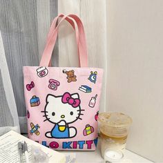 Adorable Hello Kitty Commuter Canvas Bag Authorized Sanrio Cartoon Design,Bag Durable, Water-Resistant, Perfect For School, Work & Travel Officially Licensed Product Good Quality! Fun Design! Pink School Bag With Cartoon Print, Trendy Travel Bag With Cartoon Print, Trendy Cartoon Print Bags For Daily Use, Trendy Bags With Cartoon Print For Daily Use, Pink Cartoon Print Travel Bag, Casual Pink Bag With Cartoon Print, Cute Multicolor Cartoon Print Bags, Rectangular Bags With Cartoon Print For Daily Use, Multicolor Cartoon Style Bag For Everyday Use