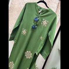 Pakistani Cotton Karandy Kurti. Beautiful Green Color That Can Be Paired With Any Jeans. Festive Straight Kurta Set With Embroidered Hem, Festive Set With Embroidered Hem Straight Kurta, Bohemian Green Sets With Floral Embroidery, Green Bohemian Sets With Floral Embroidery, Eid Straight Kurta Sets With Embroidered Hem, Festive Traditional Kurta With Embroidered Hem, Festive Summer Kurta With Embroidered Hem, Festive Eid Kurta With Embroidered Hem, Traditional Festive Sets With Embroidered Hem