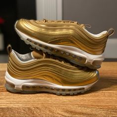 Nike Air Max 97 Lx Color: Metallic Gold/White Style Code: Cj0625-700 Women's Size 6 Condition Is New With Box, However The Box Is Missing The Lid. 100% Authentic, Guaranteed. Free Shipping Nike Air Max 97 Gold, Nike Gold Sneakers With Boost Midsole, Nike Gold High-top Sneakers, Nike Gold Sporty Sneakers, Nike Gold Sneakers With Cushioned Footbed, Nike Custom Gold Low-top Sneakers, Nike Custom Low-top Gold Sneakers, Gold Low-top Nike Custom Sneakers, Gold Sneakers With Boost Midsole And Round Toe