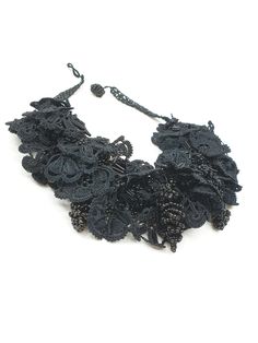 This black needle lace necklace is giving gothic vibes with its true black colour in every detail, beads and silk thread. It will embellish your neck beautifully. Black Bohemian Beaded Necklaces For Weddings, Handmade Black Necklaces For Wedding, Handmade Black Necklace For Wedding, Black Beaded Choker For Evening, Evening Black Beaded Choker, Black Bohemian Beaded Necklace For Evening, Bohemian Black Necklace For Party, Bohemian Black Beaded Necklace For Evening, Black Choker Necklace For Evening