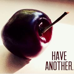 an apple with the words have another written on it, in front of a white background