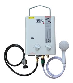 the tankless water heater is connected to two hoses and plugged in