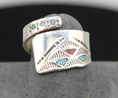 Turquoise and Coral Sterling Silver Adjustable Ring adjusts easily from a 5 to a 9 and weighs 7.48 grams Unique Multi-stone Turquoise Ring In Sterling Silver, Adjustable Nickel-free Silver Turquoise Ring, Nickel-free Southwestern Sterling Silver Rings, Gift Multi-stone Turquoise Ring In Sterling Silver, Adjustable Southwestern Turquoise Ring Nickel-free, Adjustable Rings, Rings Statement, Statement Rings, Coral