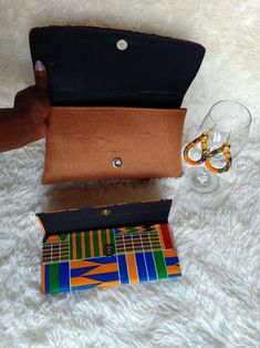 **African çlutch bags,African print bag,African leather purses, women purses. They are made out of kente and jute material They are fabulous way to bring taste to any outfit. Perfect christmas gift for her. **Comes with a matching wallet.and earrings.. Perfect gift for loved ones. For wholesale kindly message us. Ship via dhl express. Thank you for stopping by. Multicolor Coin Purse With Removable Pouch As Gift, Gift Multicolor Coin Purse With Removable Pouch, Gift Coin Purse With Removable Pouch In Multicolor, Multicolor Wallets With Removable Pouch For Gift, Multicolor Wallet With Removable Pouch As Gift, Multicolor Foldable Bags For Gift, Multicolor Foldable Bag For Gift, Multicolor Foldable Bag As Gift, Trendy Clutch Bag As Gift