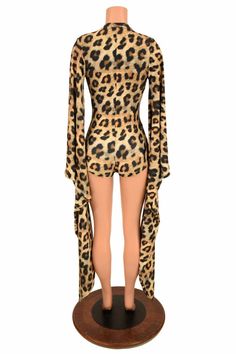 "This item is made to order, please read all the way through the listing before purchasing! This amazing romper is ready to turn heads! 50\" long kimono sleeves , and a plunging V neckline The stretchy Leopard print spandex is soooo cute! Womens Sizing (See below for instructions on where measurements should be taken) XXS: Bust 29\"-30\" / Waist 22\"-23\" / Hips 30\"-32\" Extra Small: Bust 31\"-32\" / Waist 24\"-25\" / Hips 33\"-35\" Small: Bust 33\"-34\" / Waist 26\"-28\" / Hips 36\"-37\" Mediu Fitted Long Sleeve Bodysuit For Vacation, Printed Long Sleeve Jumpsuit And Romper For Vacation, Printed Long Sleeve Jumpsuits And Rompers For Vacation, Long Sleeve Jumpsuits And Rompers For Fall Vacation, Summer Long Sleeve Bodysuit For Loungewear, Printed Long Sleeve Bodysuit For Parties, Long Sleeve Jumpsuits And Rompers For Beach In Fall, Long Sleeve Printed Jumpsuits And Rompers For Beach, Long Sleeve Printed Jumpsuits For The Beach