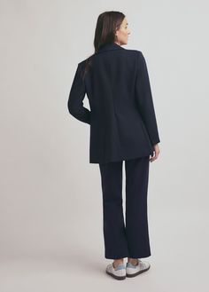 Borrowed from the boys, this double-breasted blazer has classic menswear styling--structured shape, notch lapels, marble-finished buttons and front flap pockets. Cut from a rich navy fabric, The Phoebe Blazer is a true classic and looks especially sharp paired with the coordinating Phoebe Crop Flare Pant.63% Polyester, 32% Rayon, 5% ElastaneCare Instructions:Dry clean onlyGaby is 5'9" wearing size Small Formal Double-breasted Pea Coat With Concealed Placket, Business Double-breasted Suit With Concealed Placket, Double Breasted Business Suit With Concealed Placket, Double-breasted Peacoat With Double Button For Work, Blue Double-breasted Peacoat With Notch Lapel, Navy Double-breasted Peacoat For Office, Double-breasted Notch Lapel Pea Coat For Work, Notch Lapel Double-breasted Pea Coat For Work, Workwear Pea Coat With Notch Lapel And Double-breasted Fastening