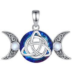 an image of two moon pendants with blue crystals