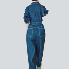 Be transported back to the Pre-millennium with our 2023 Spring-Summer Collection medium wash baggy denim overall! A timeless classic with modern day flair. this one-of-a-kind piece will have you feeling nostalgic and looking fashionably hip. Crafted from luxe denim and featuring a bold buttoned closure. this overall exudes retro chic sophistication.Distinctive Features: 90s Style: Relive the 90s in style with this classic denim overall. Medium Wash: A timeless wash that adds a touch of effortles High Rise Denim Blue Utility Jumpsuit, Medium Wash Relaxed Fit Denim Utility Jumpsuit, Casual Dark Wash Denim Overalls, Baggy Blue Straight Leg Overalls, Blue Baggy Straight Leg Overalls, High Rise Medium Wash Relaxed Fit Overalls, High Rise Relaxed Fit Overalls In Medium Wash, Washed Blue Denim Jumpsuit With Pockets, Denim Blue Washed Overall Jeans