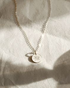 Directions: Add your initials. Wear everyday. Everyday Personalized Flower Pendant Charm Necklaces, Dainty Hand Stamped Round Disc Necklaces, Dainty Hand Stamped Round Disc Necklace, Sterling Silver Birth Flower Initial Pendant Charm Necklace, Sterling Silver Birth Flower Initial Charm Necklace, Minimalist White Charm Necklaces, White Minimalist Charm Necklace, Everyday Round Charm Necklaces, Minimalist White Charm Necklace