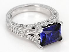 Vanna K ™ for Bella Luce ® lab created sapphire and white diamond simulant 4.81ctw baguette and round, Platineve® ring. Measures approximately 0.38"L x 0.13"W and is not sizeable. Each Vanna K™ design has a signature label that features a lab created sapphire. Gia Certified Square Cut Sapphire Ring, Elegant Gia Certified Square Cut Sapphire Ring, Elegant Rectangular Lab-created Sapphire Rings, Elegant Lab-created Radiant Cut Sapphire Ring, Elegant Radiant Cut Lab-created Sapphire Ring, Elegant Princess Cut Lab-created Sapphire Ring, Gia Certified Square Cut Blue Sapphire Ring, Gia Certified Blue Square Cut Jewelry, Blue Square-cut Gia Certified Jewelry