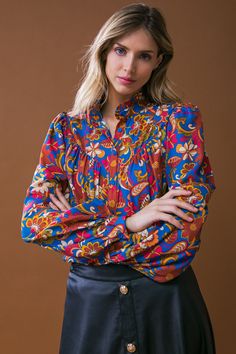 Look impressively elegant in the IMPRESSIVE BLOSSOM WOVEN TOP! This fashionable top features a beautiful print, a ruffled high neckline, long sleeves, and a button-down closure. Crafted from high-quality materials, it's sure to make you feel and look great for any occasion. DetailsSelf : 100% Polyester Size & Fit- Model is 5`8" And Wearing Size Small- Measurements Taken From Size Small- Approx. Length: 24" Holiday Tops, Woven Top, Vintage Inspired Design, High Neckline, Holiday Dresses, Business Fashion, Green And Brown, Sequin Dress, Make You Feel