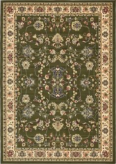 a green rug with floral designs on the bottom and beige trimmings around it