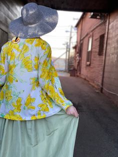 "Bright as sunshine yellow floral Vera button down blouse. All nylon ⭐️ Marked a size 14 In excellent condition with no flaws of note. Measurements Bust 40\" Length 25\" Please message me with questions before purchasing. All sales are final and ship fast from the Vermont shop. Find us on Instagram @anasclosetfullofcolor Thankyou XO" Summer Flowy Button-up Blouse, Flowy Button-up Top For Spring, Vintage Spring Vacation Blouse, Spring Daywear Flowy Blouse, Spring Button-up Blouse For Day Out, Retro Button-up Blouse For Day Out, Retro Summer Blouse With Floral Print, Vintage Floral Print Blouse For Vacation, Retro Summer Button-up Blouse