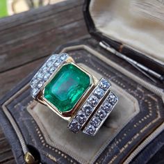 Stunning, Spectacular, Unique, One Of A Kind Ring .. The ring made from 18k Yellow Gold, Approximately 7ct Bright, Green Color, approximately 2ct Diamond ... Antique Box for Display Only .. Very Good Pre Owned Condition. Come with Appraisal $14,000 Formal Octagon Emerald Diamond Ring, Luxury Diamond-cut Emerald Ring For Formal Occasions, Ceremonial Yellow Gold Emerald Heirloom Ring, Luxury Emerald Ring With Diamond Cut For Formal Events, Luxury Emerald Ring With Diamond Cut For Formal Occasions, Luxury 14k Gold Emerald Wedding Ring, Ceremonial Heirloom Yellow Gold Emerald Ring, Luxury Platinum Emerald Ring With Diamond Cut, Heirloom Diamond Cut Emerald Ring For Anniversary