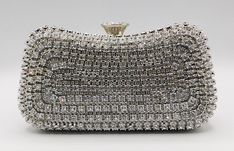 *New* Vintage Rhinestone Evening Handbag  Wedding Party Clutch Purse 10067/Silver This brand new elegant bag is perfect for brides and bridesmaids. perfect for wedding party. It is made with Rhinestone vintage style. Very fashionable design and new arrival, this bag comes with a long metal strap . you can exchange the straps to use it as shoulder bag, purse and clutch. Match any dress. Product Features: *  Stunning Evening Bags With Simple & Elegant Style *  Classic Clutch Bags for Formal Occasi Glamorous Silver Bag With Rhinestones, Elegant Silver Sparkling Bag, Elegant Silver Sparkling Bags, Elegant Silver Evening Bag With Bling, Elegant Silver Crystal Bag, Silver Sparkling Crystal Evening Bag, Elegant Silver Crystal Bags, Silver Embellished Evening Bag For Prom, Silver Rhinestone Evening Bag For Banquet