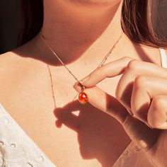 This beautiful oval Sunstone cabochon necklace is sure to catch the light and the attention of your friends! Each stone is bezel set in 925 sterling silver or plated with either 18k vermeil gold or 18k rose gold. It's perfect on its own or layered with other necklaces! Gemstone is 8 mm x 10 mm Please note that each pendant is handmade and there may be some slight variations from listing photo. Available in: * YELLOW 18K VERMEIL GOLD.  * ROSE 18K VERMEIL GOLD. * BRIGHT STERLING SILVER.  We have t Oval Clavicle Chain Jewelry For Gift, Dainty Oval Cabochon Birthstone Jewelry, Oval Amber Cabochon Jewelry, Amber Oval Pendant Necklace, Dainty Oval Pendant Jewelry Gift, Oval Amber Birthstone Jewelry, Oval Locket Necklaces For Mother's Day, Dainty Orange Jewelry For Gift, Dainty Orange Jewelry For Gifts