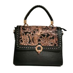 Featuring a gorgeous chiseled artisan design, this rustic  Hand Tooled Leather Bag will help you bring a little vintage flair to your everyday outfit. The perfect size for fitting all of your everyday essentials, this purse was actually handmade with love and care  with help of talented  artisans , giving it a rustic touch that's hard to find in stores.  Crafted from genuine cowhide leather and best for casual and everyday wear.  height: 23cm. 9 inches width : 28cm.  11inches  base: 12cm.    4.5 Traditional Engraved Rectangular Bag, Traditional Engraved Rectangular Bags, Traditional Rectangular Engraved Bag, Artisan Engraved Rectangular Bag, Artisan Rectangular Engraved Bag, Artisan Rectangular Engraved Bags, Black Hand Tooled Tote Shoulder Bag, Black Hand Tooled Tote Bag, Hand Tooled Tote Bag As Gift