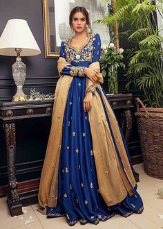 ✨Beautiful and elegant blue anarkali suit for all size women, silk long Anarkali,sequens hand work  anarkali ,plus size wedding floor length anarkali.  Coblet blue floor length hand work embroidered Anarkali,it has beautiful embroidery of sequin, zardozi, and zari over the front and small motifs all over the front and back flair.  It has gold orgenza dupatta with small motifs all over.  ✨This dress can be customise in any other colour and in all size, please contact us regarding any changes if you want.We will make this dress as per your choice. ✨Please note that this outfit is not a replica of low quality. We make garment on the order of our customers.we don't make it in bulk, This will be exclusively made for you and we give out best to make outfit look unique.  ✨We use high quality fabr Gold Anarkali Floor-length Churidar, Gold Anarkali Churidar Floor-length, Designer Anarkali Set With Dabka Work In Maxi Length, Blue Zari Work Anarkali Set Maxi Length, Blue Floor-length Gown For Eid, Floor-length Anarkali Set For Eid, Floor-length Dola Silk Anarkali Set With Pallu, Gold Bollywood Style Maxi Anarkali Set, Blue Anarkali Maxi Set