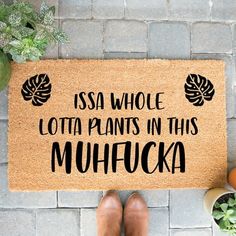 a door mat that says, csa whole lota plants in this muhicka