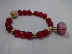 Stretch Red Glass Beads Bracelet with Glass Crown Charm. Magnetic Gold Tone Bracelet. Gold Tone Beads. Organza Bag / Gift Box Included with Purchase Packed with extra care to avoid damages while shipping Thank you for shopping at The PJ Company!! Red Bracelets With Heart Charm And Round Beads, Red Faceted Round Bracelets, Red Czech Glass Bracelet With Round Beads, Red Beaded Heart-shaped Bracelets, Adjustable Red Glass Bracelets, Glass Beaded Bracelets, Red Glass, Organza Bags, Arm Band