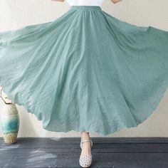 "Linen Women's Skirt, Green Linen Long Skirt, Bridesmaid Skirt, Summer Skirt, Beach Skirt, Fall Spring Skirt ★Color:Light Green ★Material:Cotton Linen ★Model Size: -- Model wear size M -- Model is 5'4\"/104lb  -- Model measurements (bust 31\" / waist 28.3\" / hips 35\" ) ★Size:  S:  Skirt Length:75 cm/29.5\" Waist:60cm-70cm /23.6\"-27.5\" M: Skirt Length:85 cm/33.5\" Waist:60cm-70cm /23.6\"-27.5\" L:  Skirt Length:95 cm/37.4\" Waist:60cm-70cm /23.6\"-27.5\" ★ Measurements: Size S (US 4-6 | UK/AU Green Non-stretch Tiered Skirt, Green Non-stretch Maxi Skirt, Flowy Solid Color Beach Skirt, Solid Color Flowy Beach Skirt, Solid Color Midi Skirt For Beach, Solid Bohemian Ruffled Skirt, Bohemian Ruffled Skirt In Solid Color, Solid Color Bohemian Ruffled Skirt, Green Non-stretch Skirt With Elastic Waistband