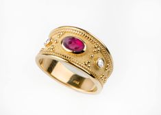 A beautiful byzantine ring inspired by our Greek ancestors! *real images of the ring, taken by us* Dimensions: 10.5mm width at the top. Bottom: 4.5mm width Gemstones: - Simulated Ruby (cubic zirconia) - Simulated Diamonds (cubic zirconia) Material: - Sterling Silver (925) - 9K Gold (375) - 14K Gold (585) *All signet rings are hallmarked on the back for certification* - We offer FREE Worldwide DHL & FedEx Shipping! - Branded DanelianJewelry Gift Box with each order! Our customer service is availa Byzantine Oval Wedding Rings, Oval Byzantine Style Anniversary Rings, Byzantine Style Oval Anniversary Rings, Oval Byzantine Gemstone Ring, Byzantine Oval Gemstone Ring, Luxury Byzantine Style Ruby Ring Gift, Byzantine Gemstone Ring As Gift, 14k Gold Byzantine Ring Gift, Luxury Gold Byzantine Style Ruby Ring