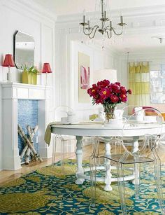 a dining room table with flowers on it