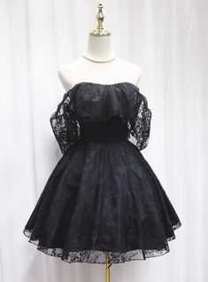 Aquiver with charm and sophistication, this homecoming dress is designed to make you feel like a star. The rich black lace fabric offers a timeless and elegant look, perfect for formal events. The off-the-shoulder neckline features a romantic ruffled overlay, adding a touch of femininity and grace. The fitted bodice accentuates your waist, while the full, A-line skirt flows gracefully, providing both volume and movement. The delicate lace sleeves add an extra layer of elegance, ensuring you look stunning from every angle. Made from luxurious materials, this dress promises comfort and ease as you enjoy your special night. Ideal for those who want to blend classic elegance with contemporary style, this homecoming dress is a standout choice. With its intricate design and attention to detail, Black Lace Fabric, Mini Homecoming Dresses, Bridal Hair Jewelry, Lace Strapless, Homecoming Dresses Black, Lace Dress Black, Style Noir, Dress Silhouette, Bridal Pearls