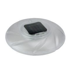 a plastic lid with a small black object on it