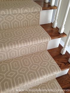 the carpeted stairs are clean and ready for us to go down them into the house