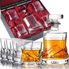 an assortment of whiskey glasses in a gift box