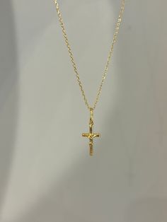 Our cross necklace is a classic, simple and elegant - perfect for everyday wear! Information: ✨ Sterling Silver (925 stamped) | 14K Gold Plated ✨ Adjustable length: 16" - 18" ✨ Hypoallergenic ✨ Tarnish resistant ✨ Water friendly Our cross necklace is highly polished, featuring an splendid level of craftsmanship and attention to detail. On the charm, you can see the image of Jesus on the cross. The charm is dainty and comfortable to wear. Plus, the necklace is adjustable. You have the ability to Cute Cross Necklace Gold, Classic Cross Clavicle Chain Necklace, Elegant Cross Necklace For Confirmation, Classic Everyday Cross Pendant Necklace, Minimalist Cross Pendant Necklace For First Communion, Everyday Classic Cross Pendant Necklace, Classic Everyday Cross Necklace, Minimalist Cross Pendant Necklaces For Baptism, Minimalist Cross Pendant Necklace For Baptism