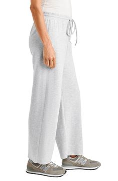 It's all about relaxed weekend vibes with these wide-leg sweatpants in a breezy cropped length. 25" inseam; 22" leg opening; 10 1/2" front rise; 14" back rise Elastic/drawstring waist 65% polyester, 31% viscose, 4% elastane Machine wash, tumble dry Imported Casual Long Pants Activewear For Relaxation, Sporty Wide Leg Bottoms For Relaxation, Casual Activewear Long Pants For Relaxation, Sporty Wide Leg Yoga Pants For Lounging, Relaxed Sweats For Leisure In Spring, Relaxed Spring Leisure Sweats, Athleisure Straight Leg Bottoms For Relaxation, Summer Relaxation Sweatpants With Elastic Waistband, Full-length Athleisure Sweatpants For Relaxation