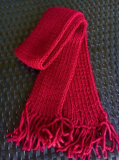 "As seen on This Is Us, Jack has flashbacks from when he was a child and LOVED his handknit red hat and handknit red scarf with fringe! A fresh color perspective for a simple, traditional knit scarf. Hand knit with care and accented with yarn fringe details, makes this kids knit scarf special. We developed our craft passed down from our Grandmother and Mom.  With family roots based in Germany, and many summers spent there as children, we've always been influenced by European style and color. A u Ethan Frome, Color Perspective, Narnia Costumes, Yarn Fringe, Knitting Scarves, Scarf With Fringe, Knitted Scarves, Family Roots, Kids Scarf