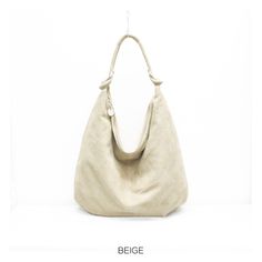 A perfect bag for shopping and carrying daily essentials Genuine Made in Italy suede oversized hobo shoulder bag Dimensions: W 44cm x H 34cm x  variable depth Outer Material: Genuine Suede/Genuine Leather Material Composition: Genuine Suede The bag is fully lined inside. with 1 zipped pocket and 1 phone pocket Top zipped and silver hardware Fast delivery! Everyday Beige Hobo Bag With Leather Handles, Beige Baguette Bag With Leather Handles For Daily Use, Versatile Beige Hobo Bag For Everyday Use, Versatile Beige Hobo Bag With Leather Handles, Everyday Beige Hobo Bag With Adjustable Strap, Everyday Beige Hobo Shoulder Bag, Beige Baguette Bag With Large Capacity For Everyday, Beige Hobo Bag With Large Capacity For Everyday, Beige Large Capacity Baguette Bag For Everyday Use