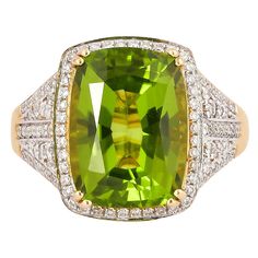 This collection features an array of pretty peridot rings! Accented with diamonds these rings are made in yellow gold and present a vibrant and fresh look. Classic peridot ring in 18K yellow gold with diamonds. Peridot: 6.520 carat cushion shape. Diamonds: 0.3902 carat, G colour, VS clarity. Gold: 5.29g, 18K yellow gold. Ring Size: US 6.75 - Size can be adjusted for free upon request - please reconfirm with your order. R642 Formal Peridot Diamond Ring In Yellow Gold, Luxury Green Gemstones With Halo Setting, Luxury Peridot Rings With Accent Stones, Formal Peridot Diamond Ring With Prong Setting, Luxury Green Diamond Ring With Pave Setting, Luxury Yellow Gold Peridot Rings, Elegant Lime Green Diamond Jewelry, Yellow Gold Peridot Jewelry With Halo Setting, Elegant Peridot Diamond Ring With Prong Setting