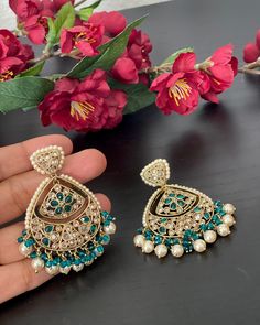 Beautiful Mehendhi finished pearl  polki jumkas  for your ethnic party wear dresses. Weight of this pair of earrings : 1.2 Oz. Product care: Avoid contact with Chemicals such as Perfumes or any Sprays. Prevent the Jewellery from the water. Use Butter Paper or Cotton Cloth to store your Jewellery for a longer Product life. Green Cutdana Bridal Earrings For Party, Meenakari Chandelier Earrings For Eid Party, Traditional Chandbali Earrings For Eid, Eid Chandbali Earrings, Green Bridal Earrings For Wedding Eid Festival, Anarkali Chandbali Earrings For Eid, Green Bridal Earrings For Wedding And Eid, Festive Drop Bridal Earrings For Eid, Eid Anarkali Chandbali Danglers