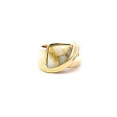 A natural gold in white quartz ring.  Bezel set in the center of the ring is a piece of white quartz with natural gold veins.  The ring has an asymmetrical swirl design and a Euro style shank. This ring is a size 6.75.  This ring cannot be sized by our goldsmith. Metal Content Guaranteed 14k yellow gold Weight: 9.4 grams Measurements of Ring 1/2 inches wide at top (12mm) 3/16 inches off the finger (5mm) 3.3mm wide shank at bottom White Modern Twist Ring Jewelry, Modern White Jewelry, White Open Ring With Tension Setting, White Rings With A Modern Twist As A Gift, Modern Twist White Ring As Gift, Modern Twist White Rings As Gift, White Jewelry With A Modern Twist For Anniversary, Unique White Rings With Polished Finish, Modern Twist White Jewelry For Formal Occasions