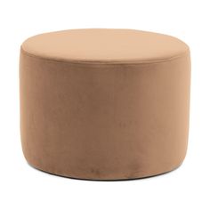 a round ottoman that is tan colored