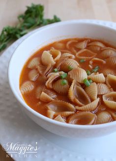 a bowl of mexican shell pasta soup on a white plate with the title above it