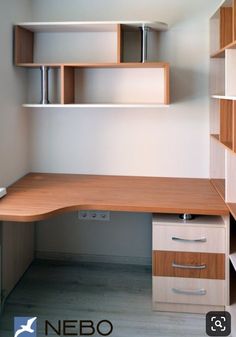 an office desk with shelves and drawers in the corner