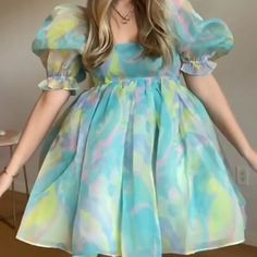 Who Doesn't Love A Dress That’s Equally As Cute As It Is Comfortable! Our Deep Summer Puff Sleeve Babydoll Dress Is A Tie Dye Base In Green And Blue. The Babydoll Silhouette And Square Neckline Make This Dress So Cute & Fun! Measurements: S - Bust 30", Sleeve Length 11.5", Length 30" M - Bust 33", Sleeve Length 12", Length 30" L - Bust 34", Sleeve Length 12.5", Length 30" Puff Sleeve Babydoll Dress, Deep Summer, Cake Dress, Dress Vacation, Puff Sleeve Mini Dress, Puff Dress, Brimmed Hat, Shopping Party, Dress Cottagecore