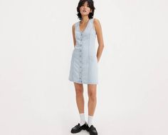 Cut with a flattering A-line silhouette, our Thora Denim Mini Dress features a v-neckline, a button-up front and a figure-hugging mini cut. An ultra-flattering denim mini dress Cut with a figure-hugging, A-line fit With a button-up front Features western yoke detailing on the back V-neck Denim Dress For Work, Fitted V-neck Denim Dress With Buttons, Spring Trendy V-neck Denim Dress, Levi's Casual Mini Dress, Chic Fitted Denim Dress With V-neck, Levi's Casual Dresses For Spring, Levi's Casual Spring Dresses, Casual Levi's Dresses For Spring, Denim V-neck Mini Dress